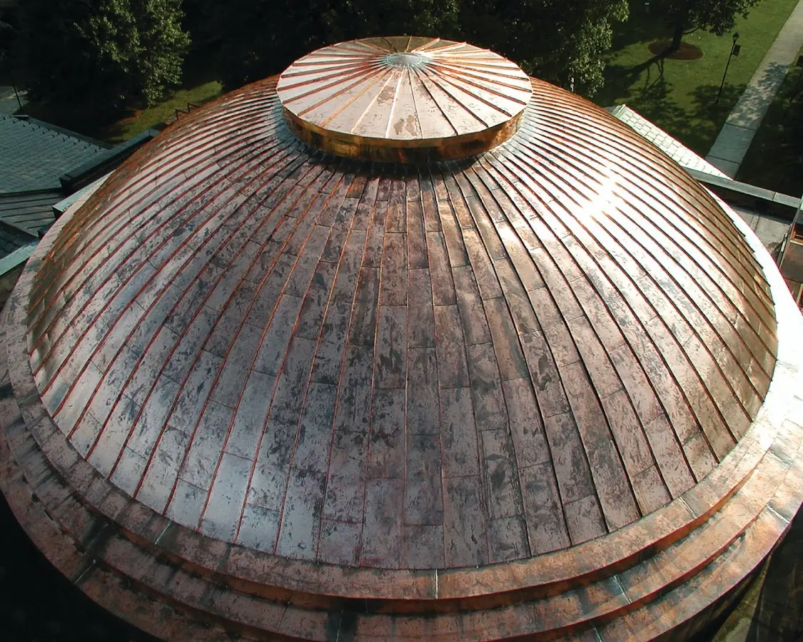 Craftsman Roofing crew installing a new roof in Roslyn Heights